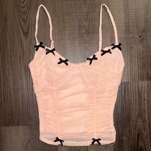 Elegant Peach Ruched Women's Top with Black Accents